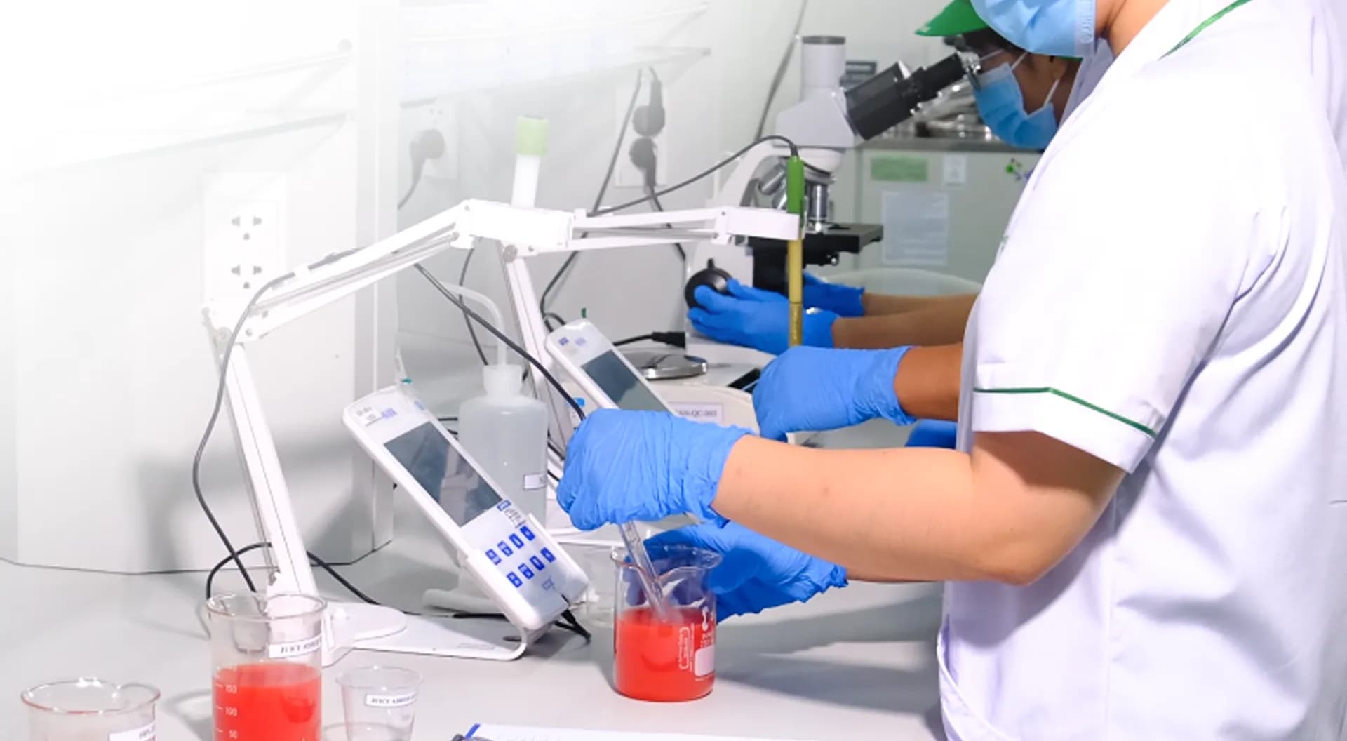 Laboratory work with samples and equipment.